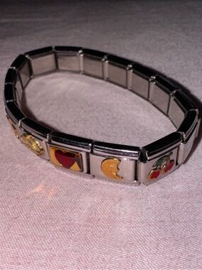 Stainless Steel Charm Stretch Bracelet with Red & Gold Enamel Accents